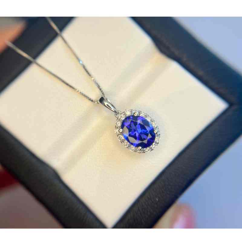 “Kate” Classic 2.00 Carat Oval Tanzanite & Diamond Halo Pendant.