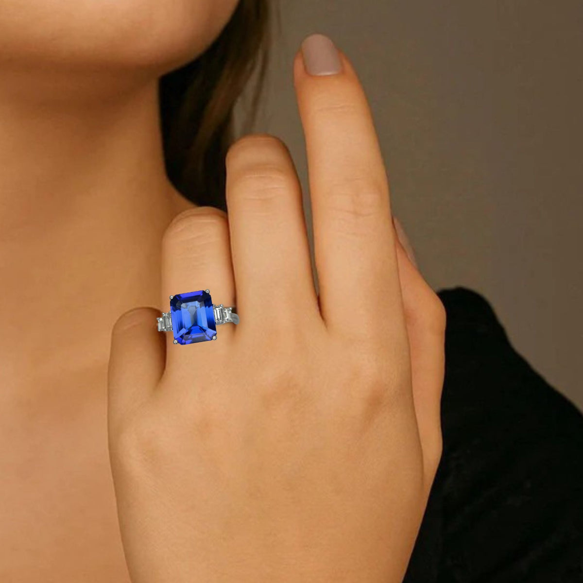 tanzanite emerald cut ring with baguette diamonds