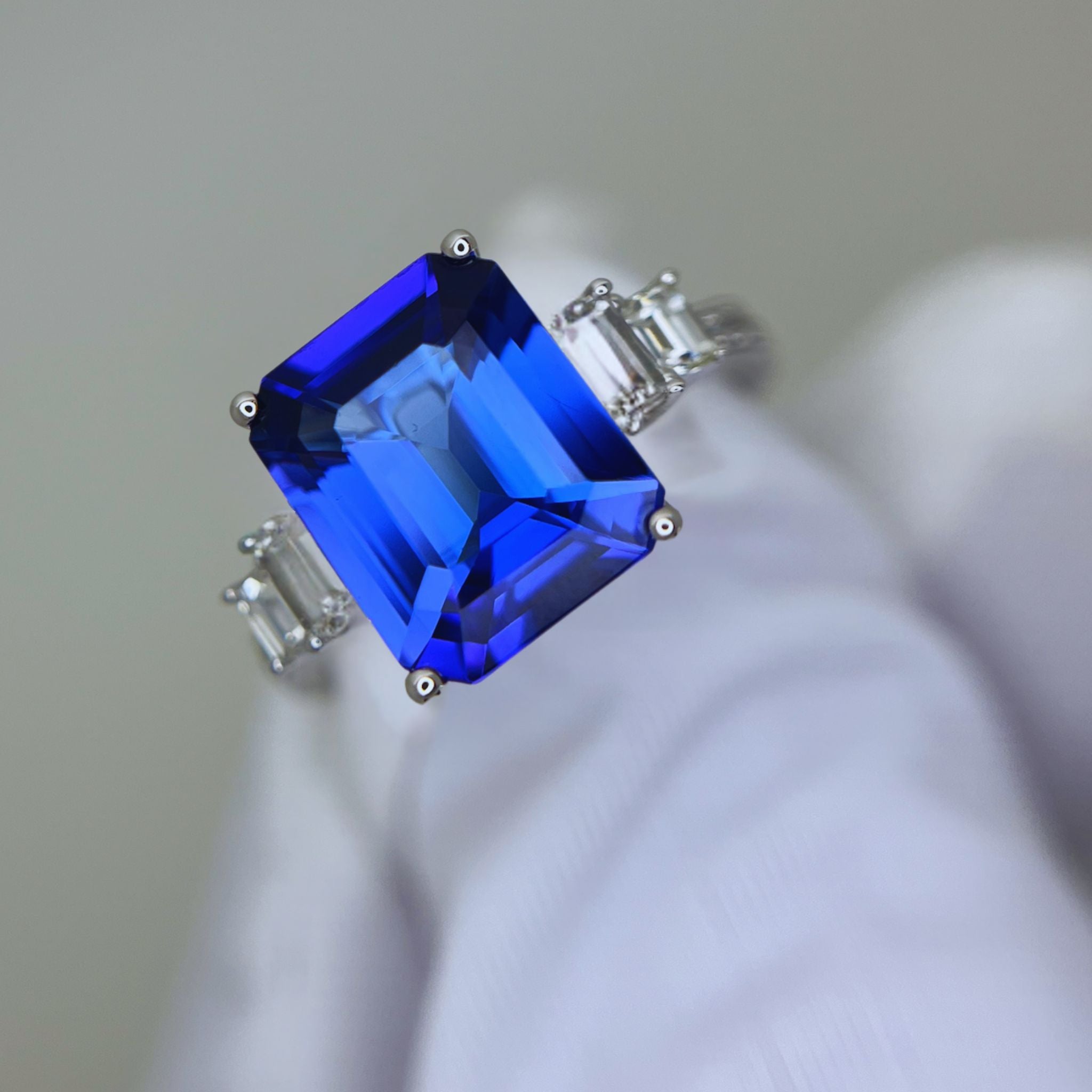 Emerald Cut Tanzanite Art Deco Ring & Baguette Diamonds.