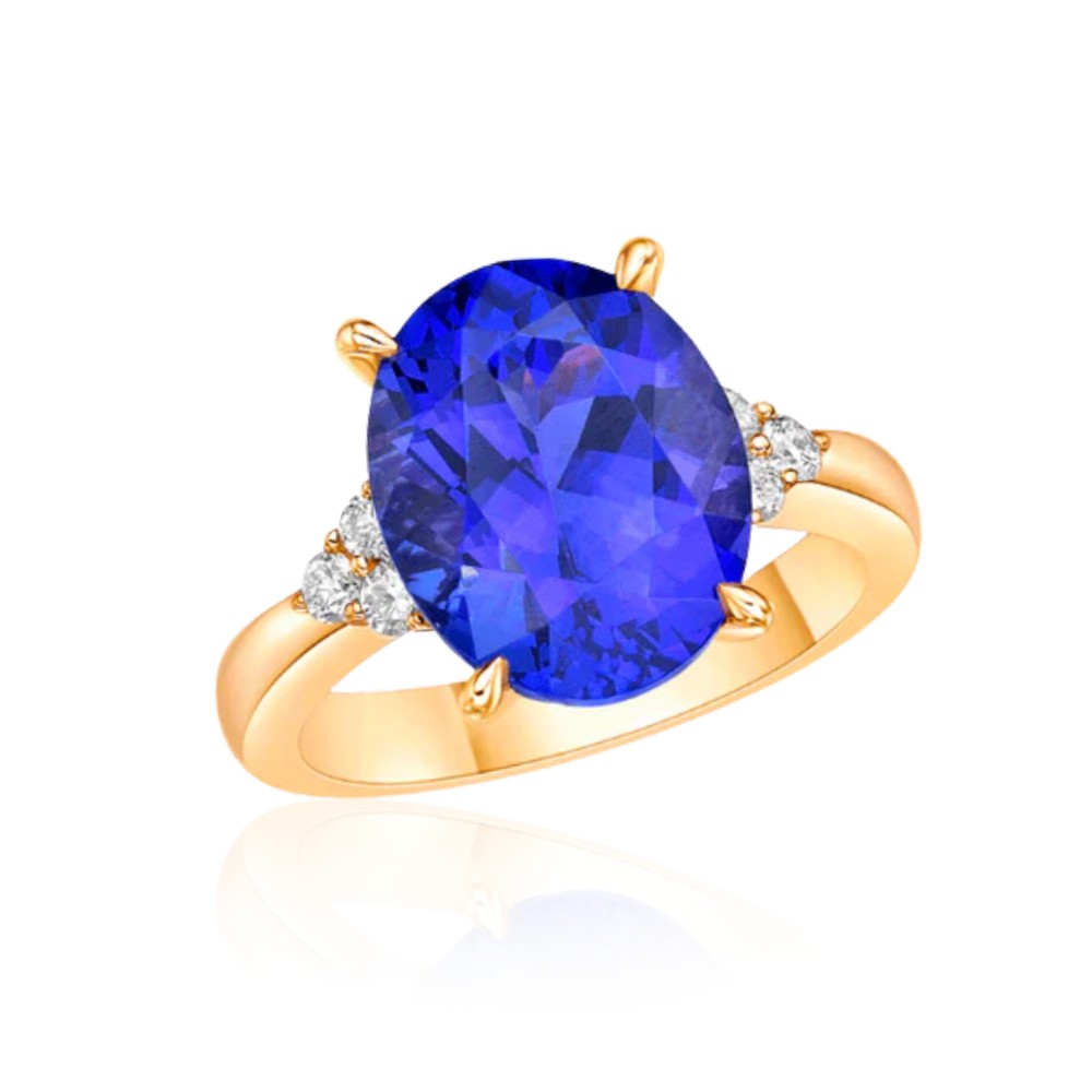 Gold ring with a large blue violet tanzanite gemstone and smaller diamonds on a white background