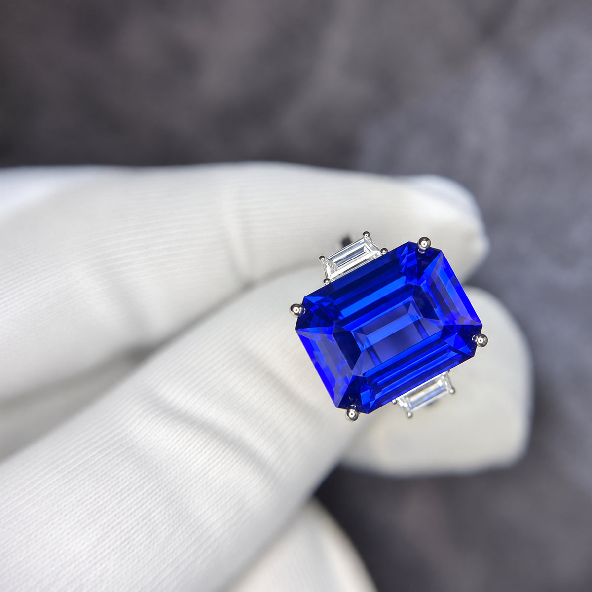 10 Carat Investment-Grade AAA+ Emerald-Cut Tanzanite Ring - IGI certified