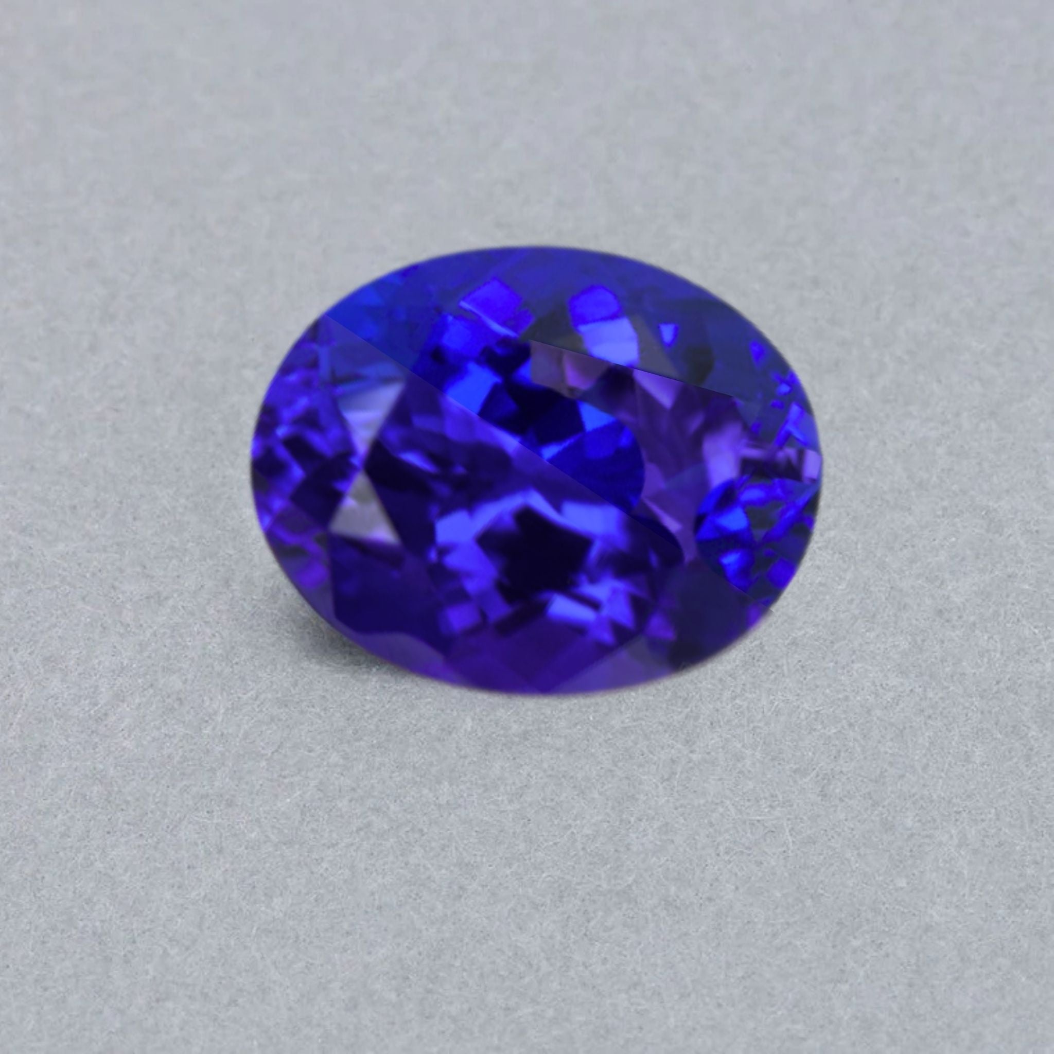Emerald-cut tanzanite gemstone with vivid royal blue colour