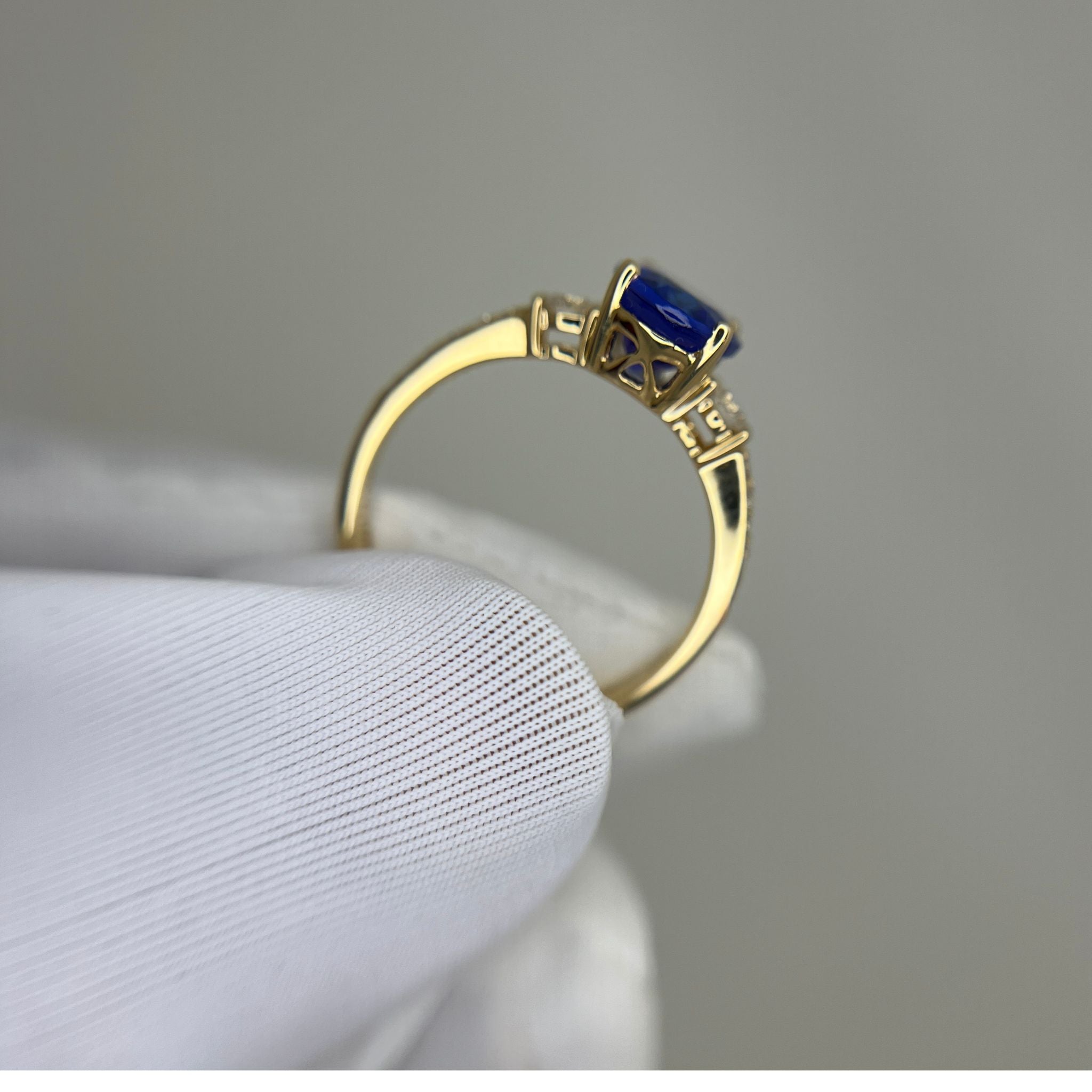 “Evening Sky” Oval Tanzanite & Diamond Ring - Yellow Gold