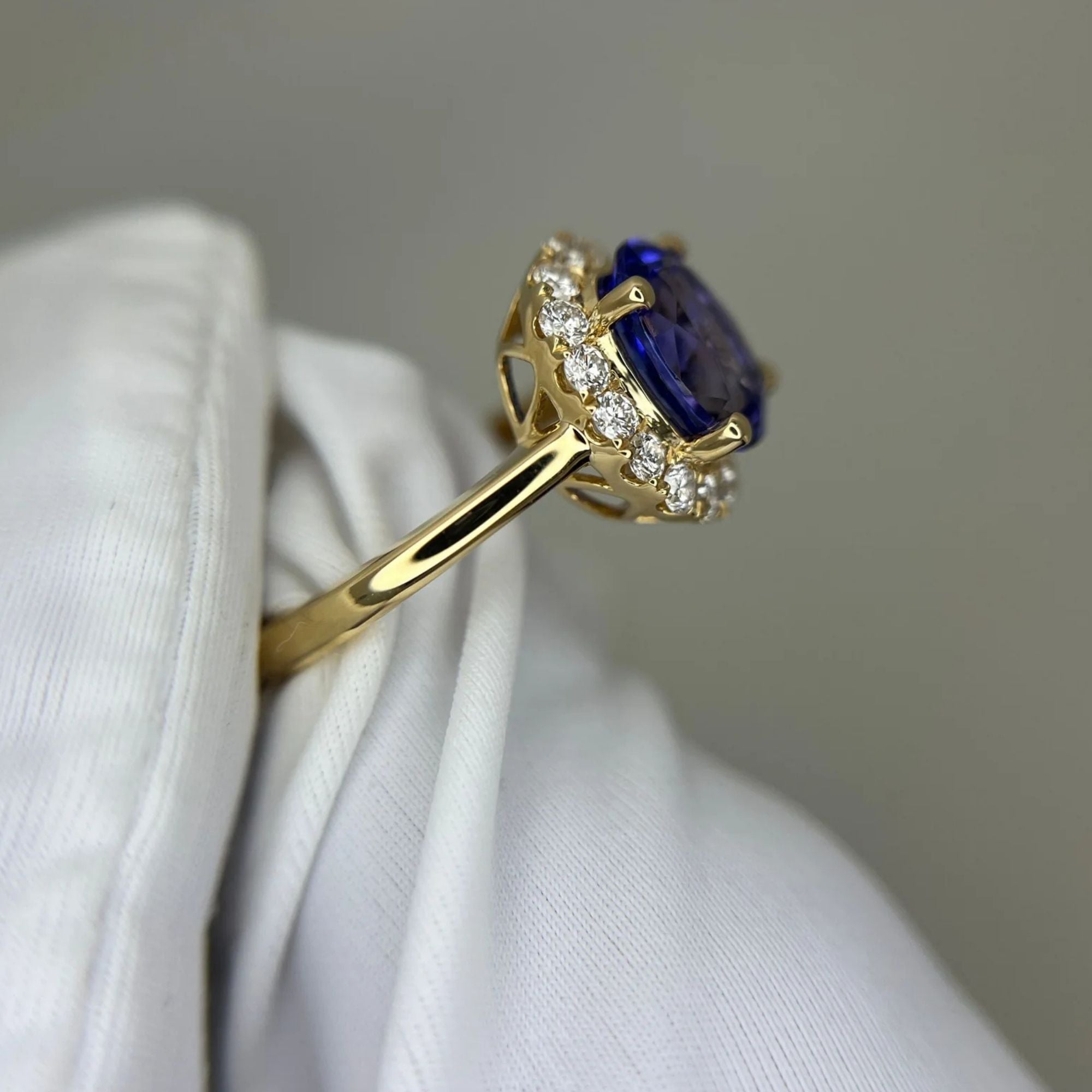 ”Kate” 2.00 Ct Oval Tanzanite & Diamond Halo Ring in Yellow Gold