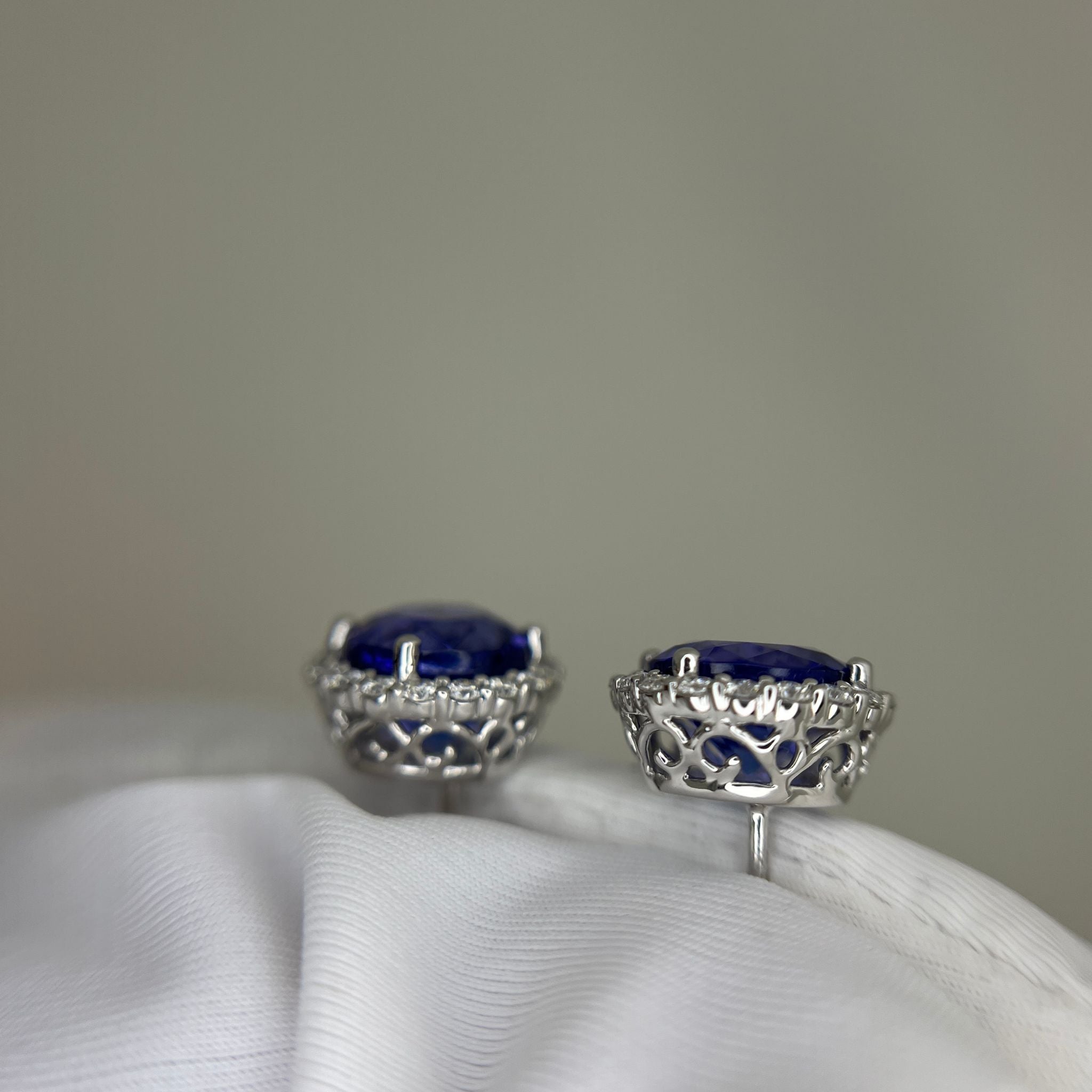 Exceptional Tanzanite (+5 Carat) and Diamond Halo Stud Earrings – 18ct White Gold