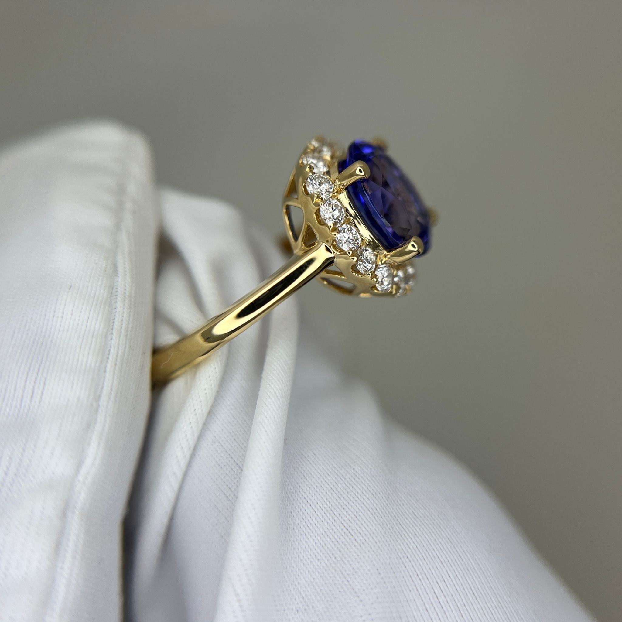 ”Kate” 2.00 Ct Oval Tanzanite & Diamond Halo Ring in Yellow Gold