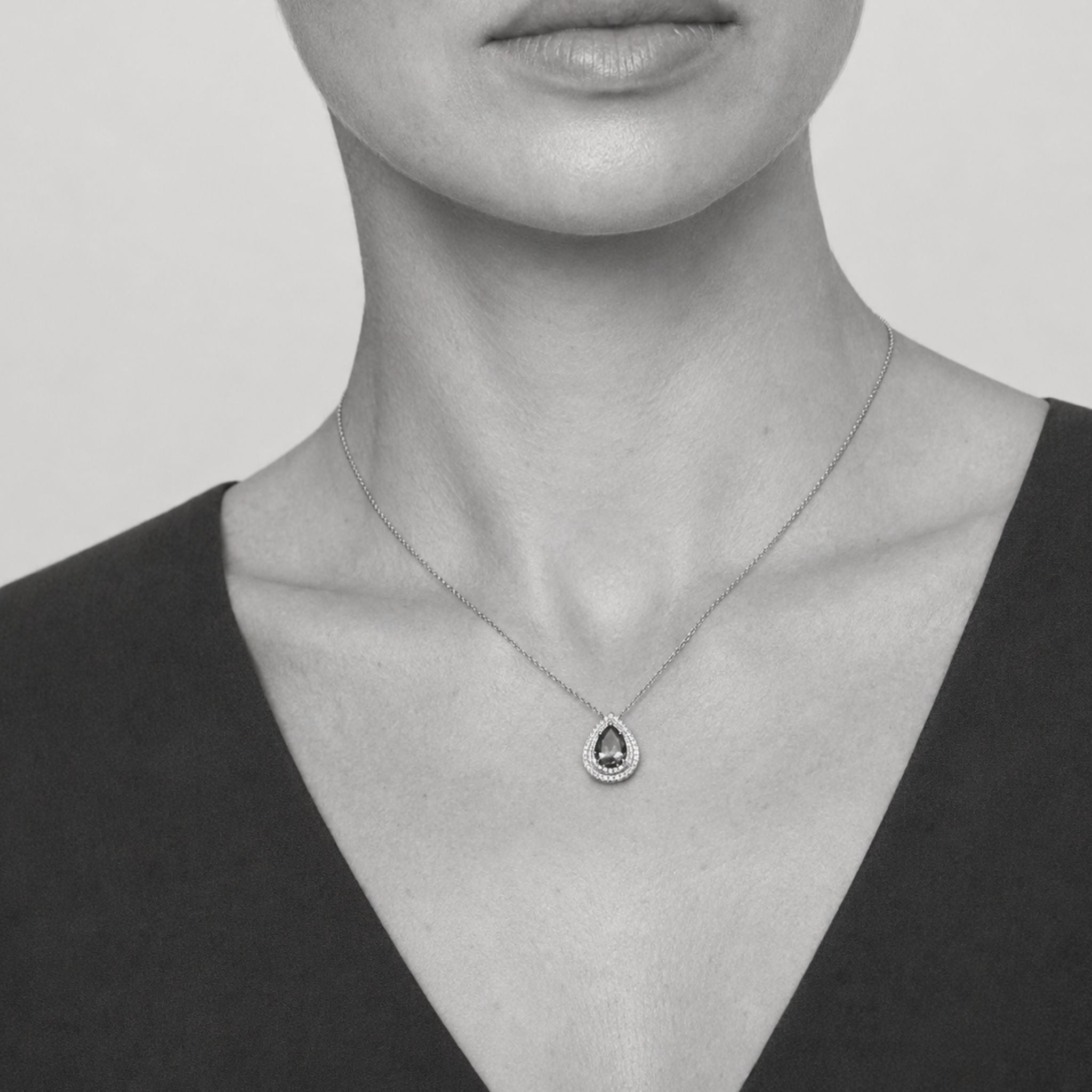 Pear-Shaped Tanzanite & Diamond Double Halo Pendant