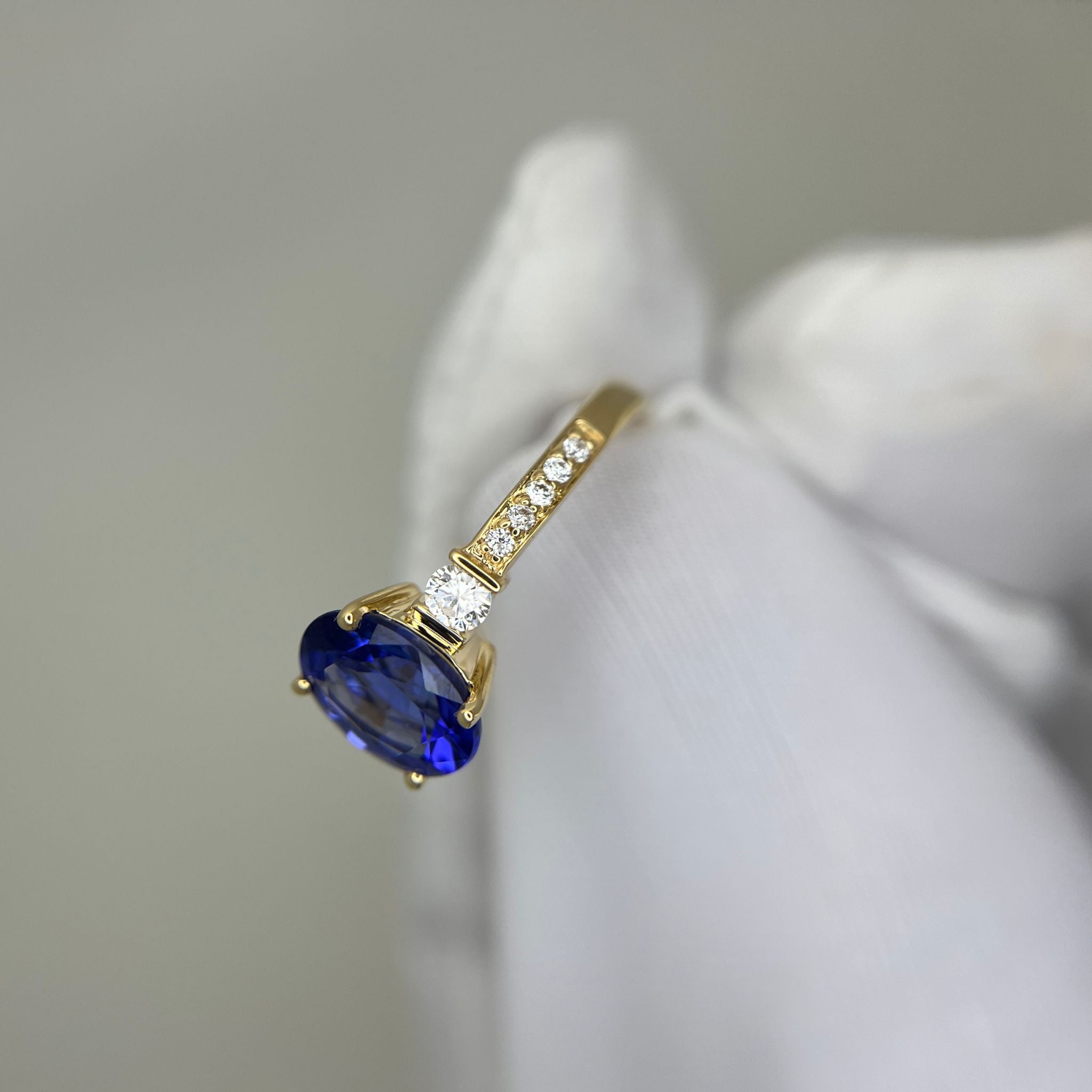 “Evening Sky” Oval Tanzanite & Diamond Ring - Yellow Gold