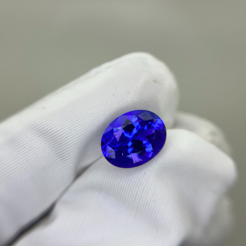 Emerald-cut tanzanite gemstone with vivid royal blue colour