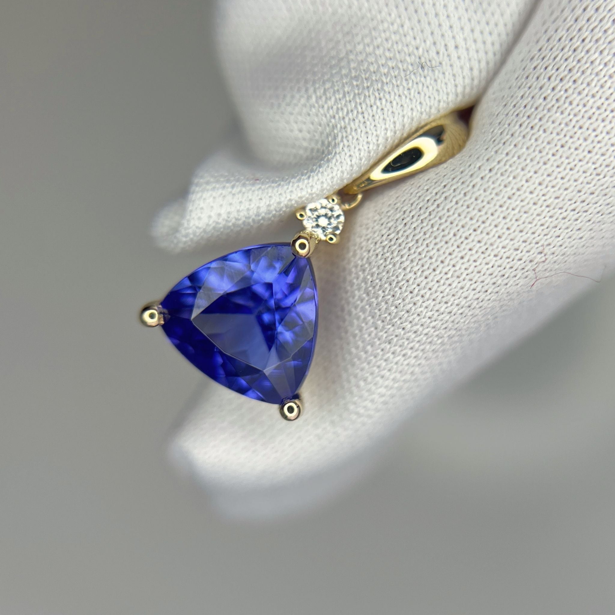 Trillion Cut Tanzanite & Diamond Pendant in Yellow Gold