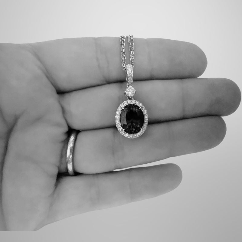 Elegant 4.65 Ct Oval Tanzanite & Diamond Pendant