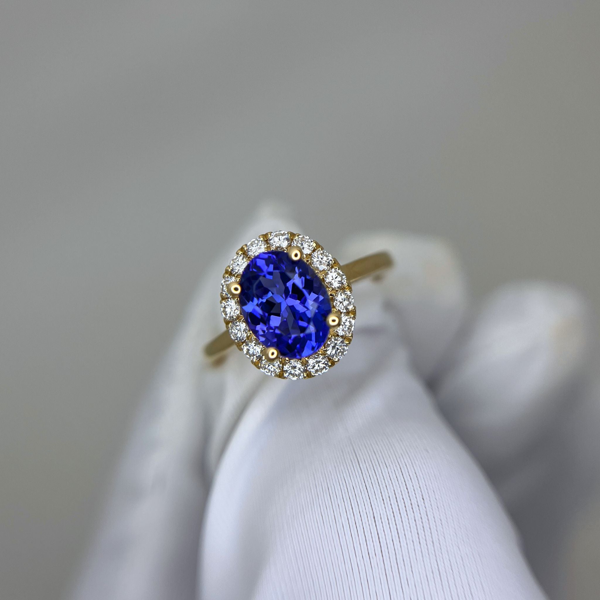 ”Kate” 2.00 Ct Oval Tanzanite & Diamond Halo Ring in Yellow Gold
