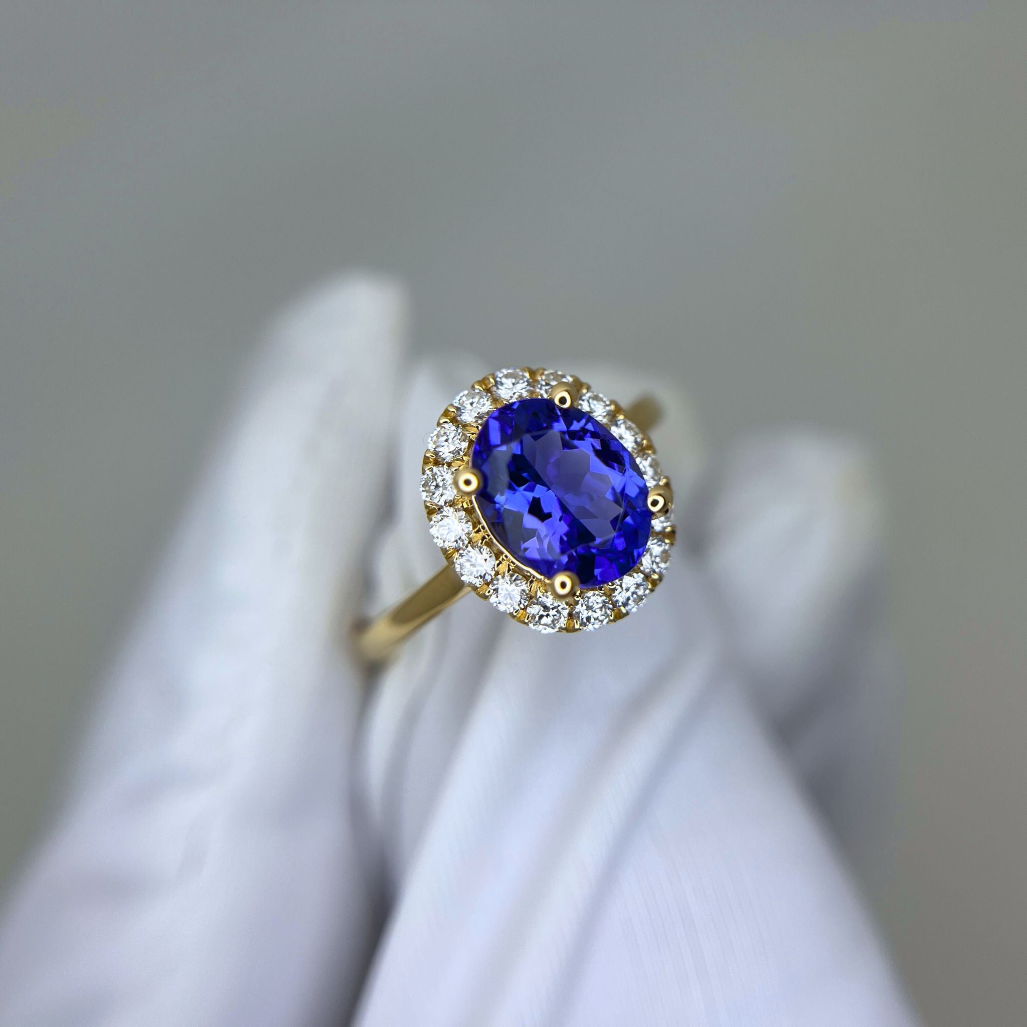 ”Kate” 2.00 Ct Oval Tanzanite & Diamond Halo Ring in Yellow Gold
