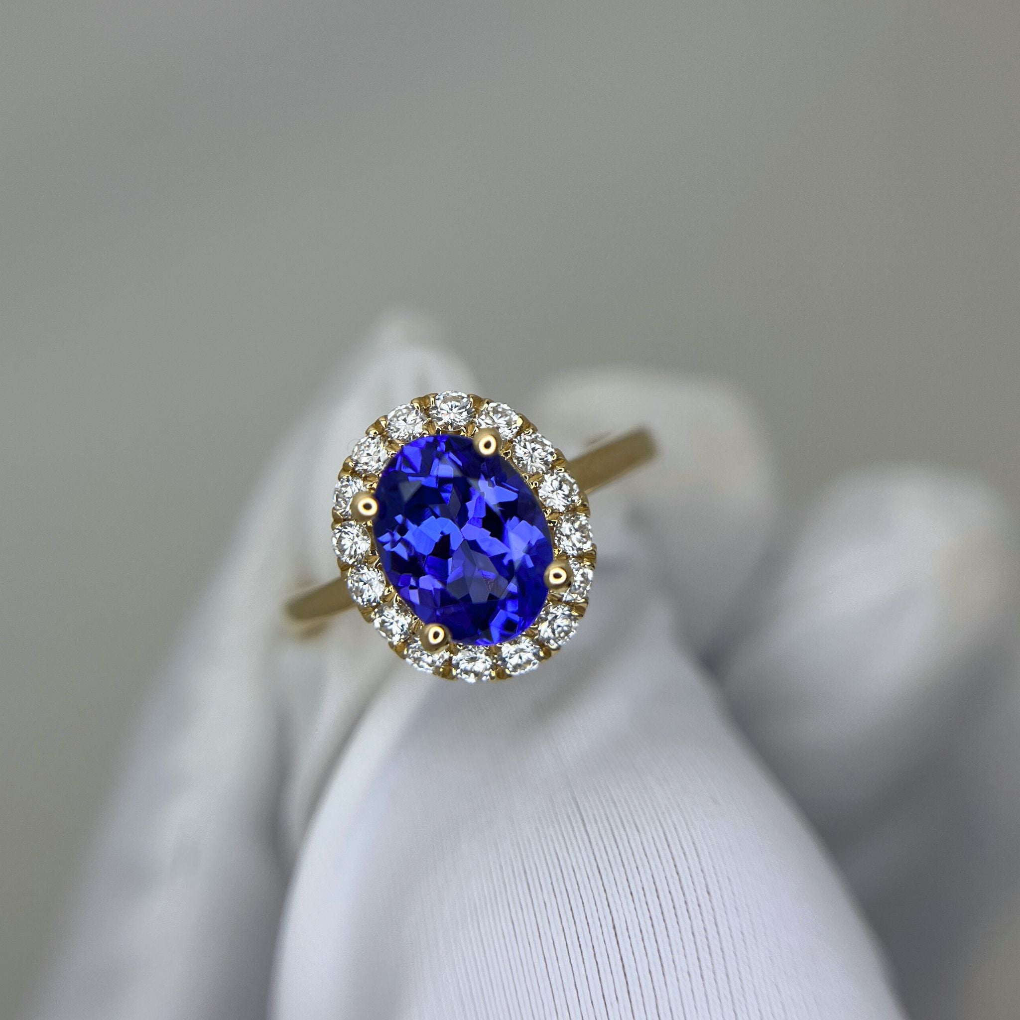 ”Kate” 2.00 Ct Oval Tanzanite & Diamond Halo Ring in Yellow Gold