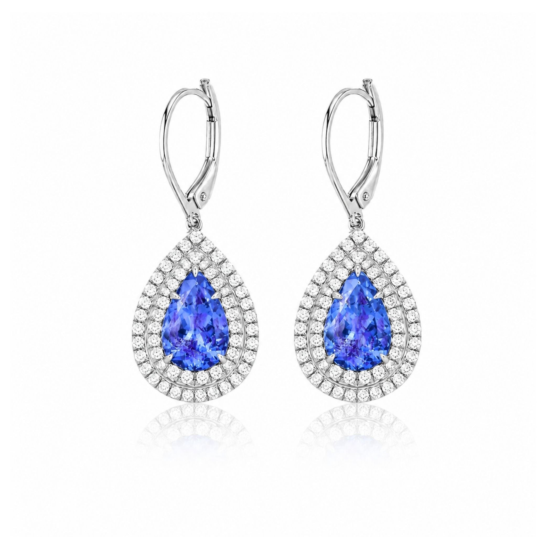 Orecchini a perno in tanzanite taglio a cuscino in oro giallo