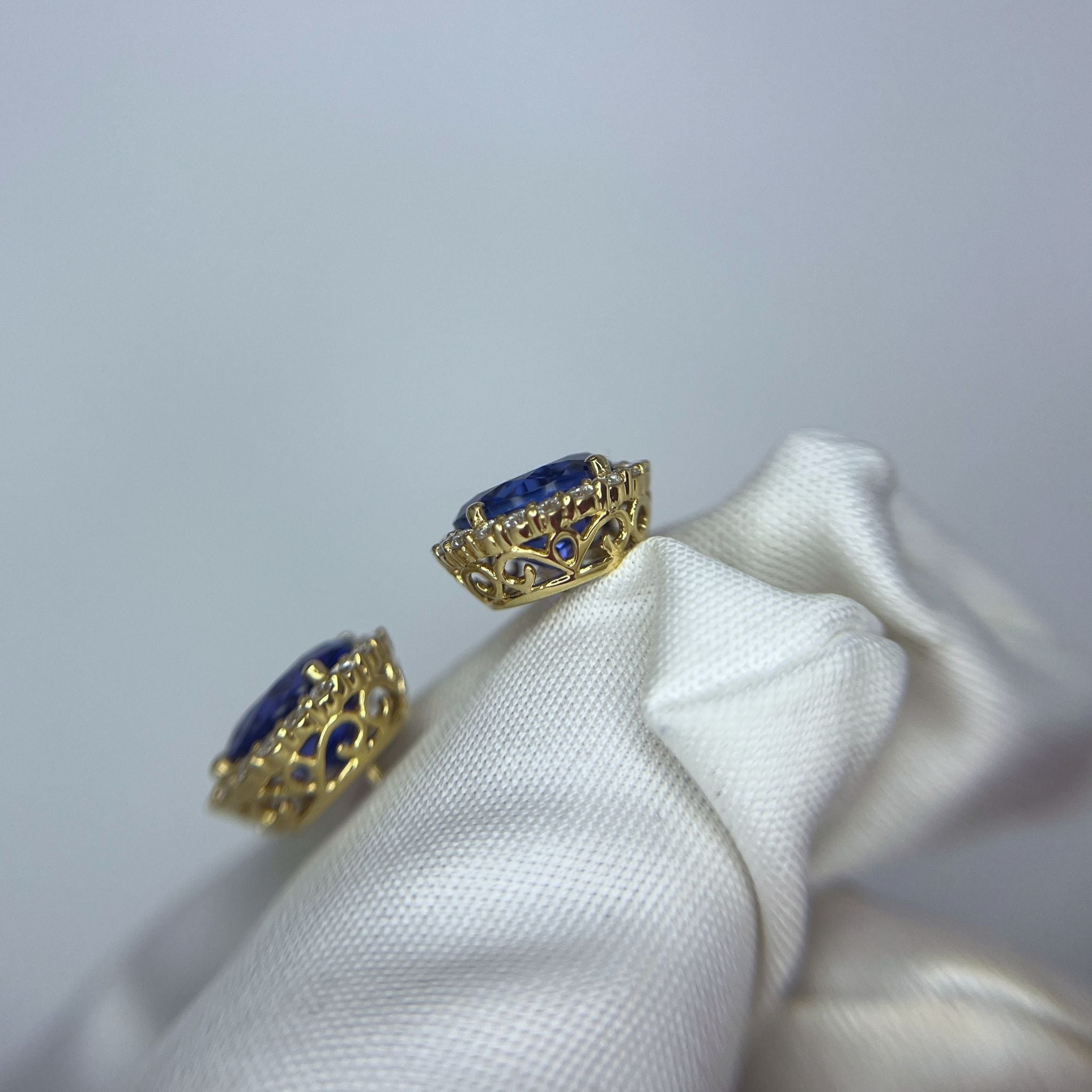 Exceptional Tanzanite and Diamond Halo Stud Earrings – 18ct Yellow Gold