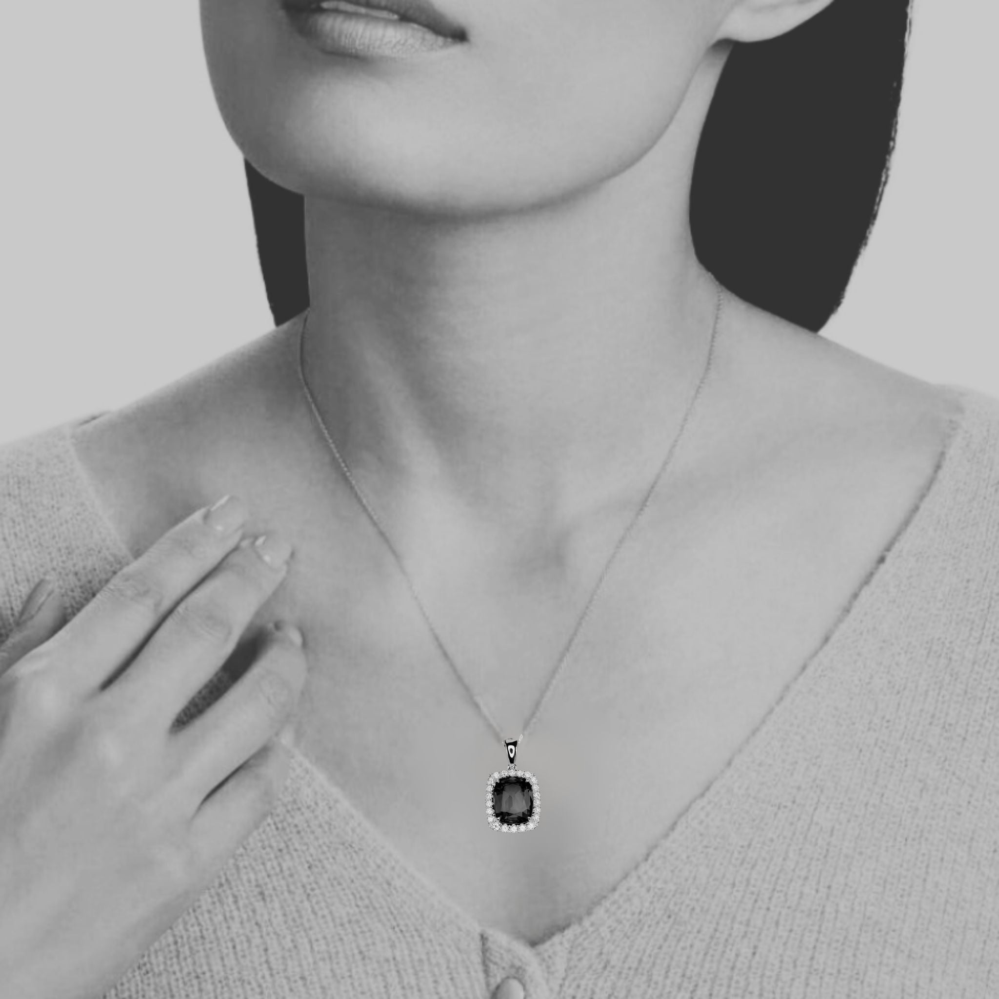 Antique Cushion Cut Tanzanite Pendant with Diamonds.