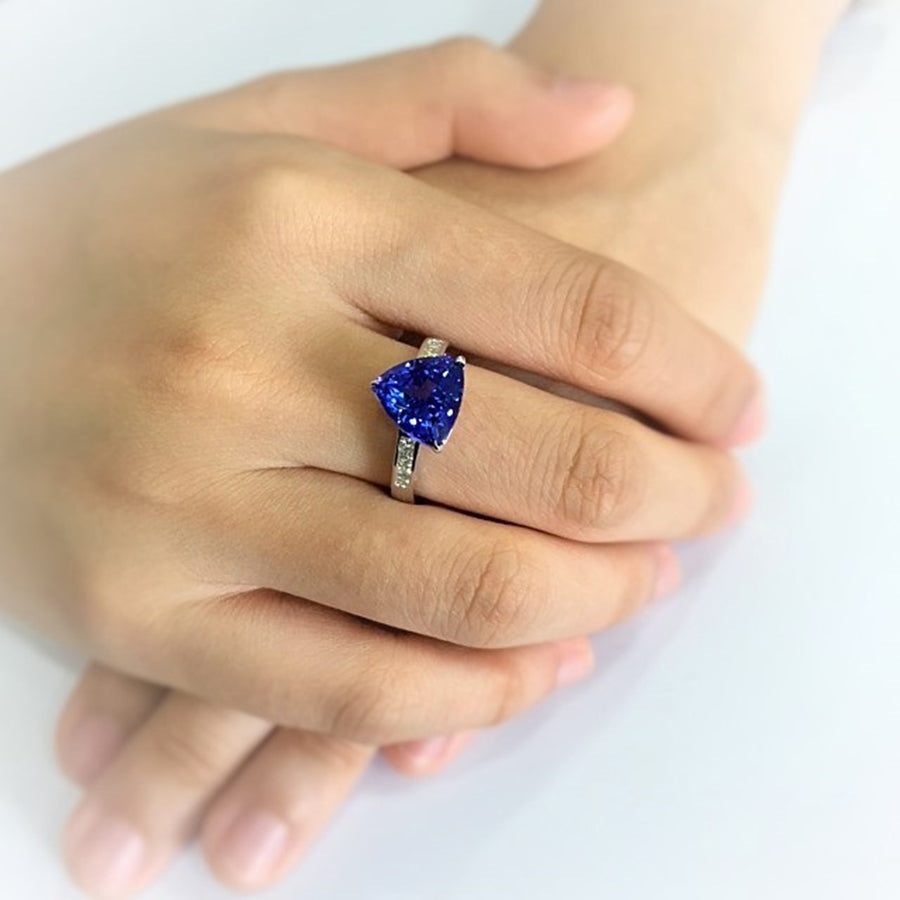 Premier 4.00 Ct Trillion Cut Tanzanite Ring with Princess Cut Diamonds