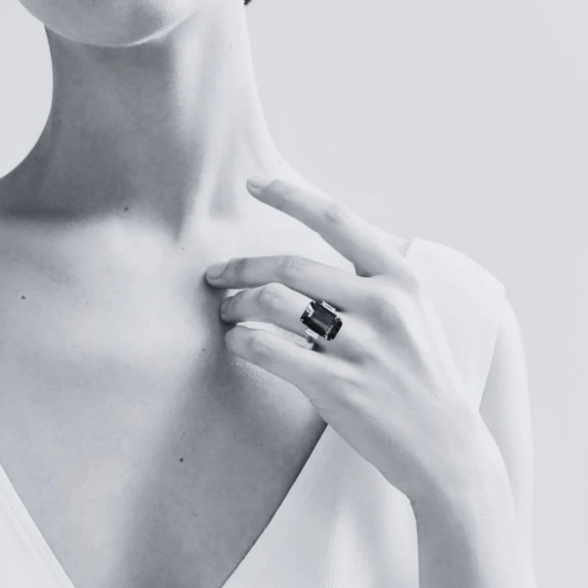 9 Carat Emerald Cut Tanzanite Ring with Baguette Diamonds - Made to Order