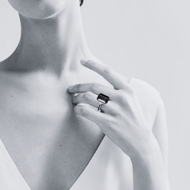 Emerald Cut Tanzanite Ring with Princess Cut  Diamonds