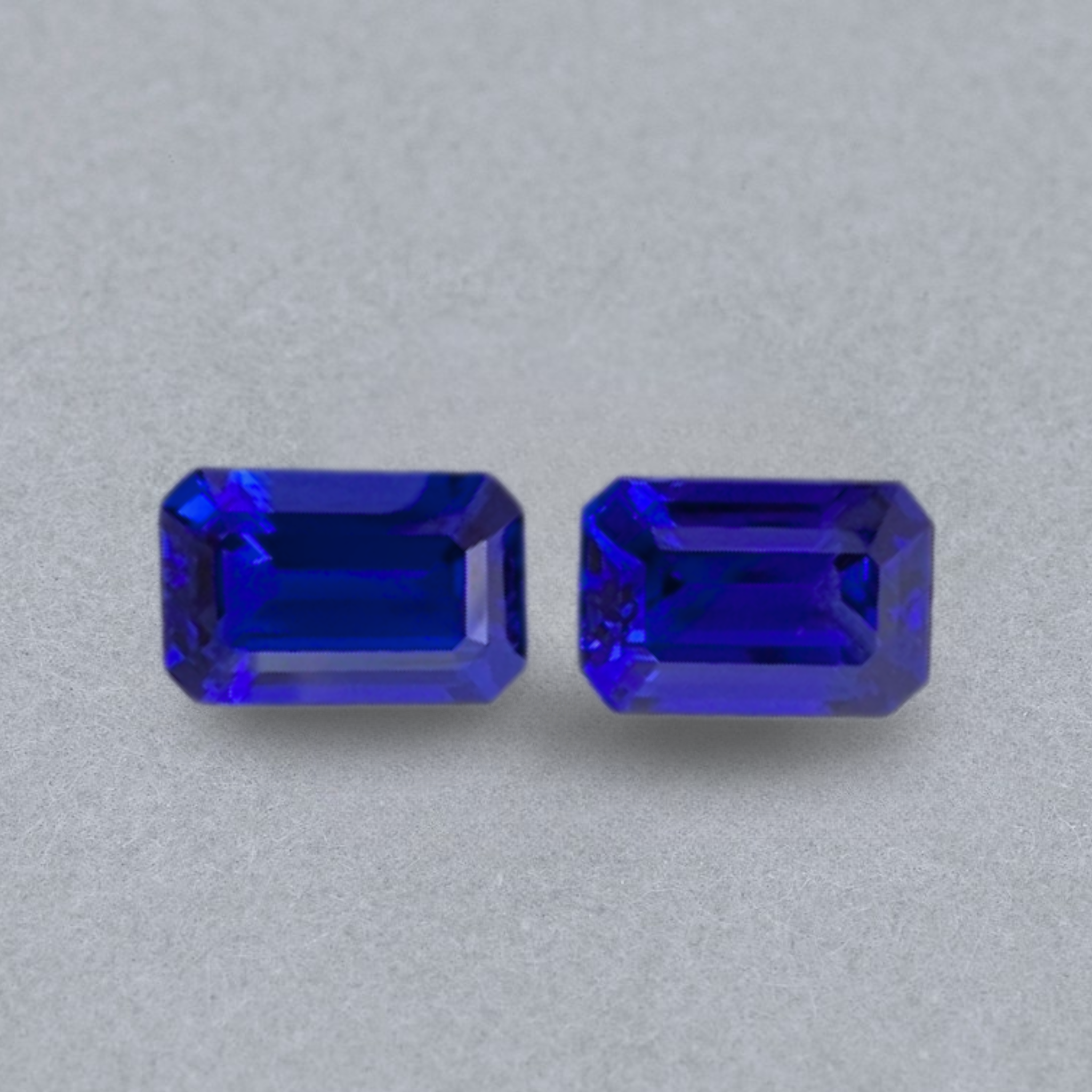 Emerald-cut tanzanite gemstone with vivid royal blue colour