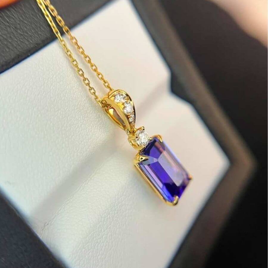 Made to Order: Exceptional Emerald Cut Tanzanite & Diamond Pendant