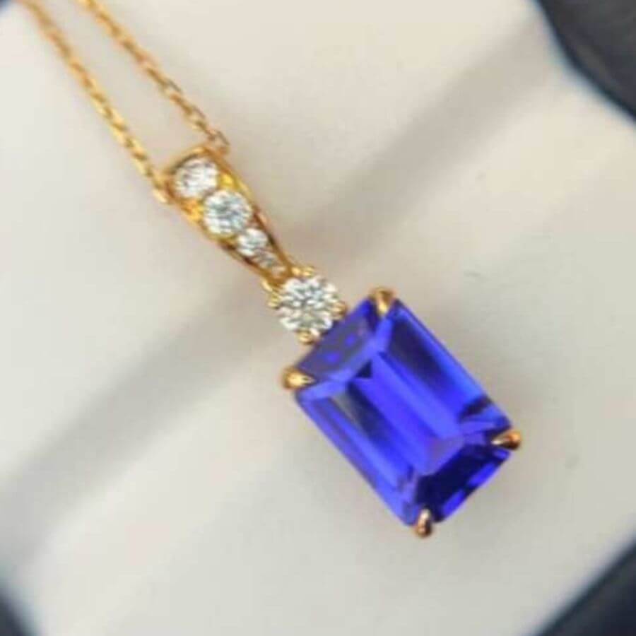 Made to Order: Exceptional Emerald Cut Tanzanite & Diamond Pendant