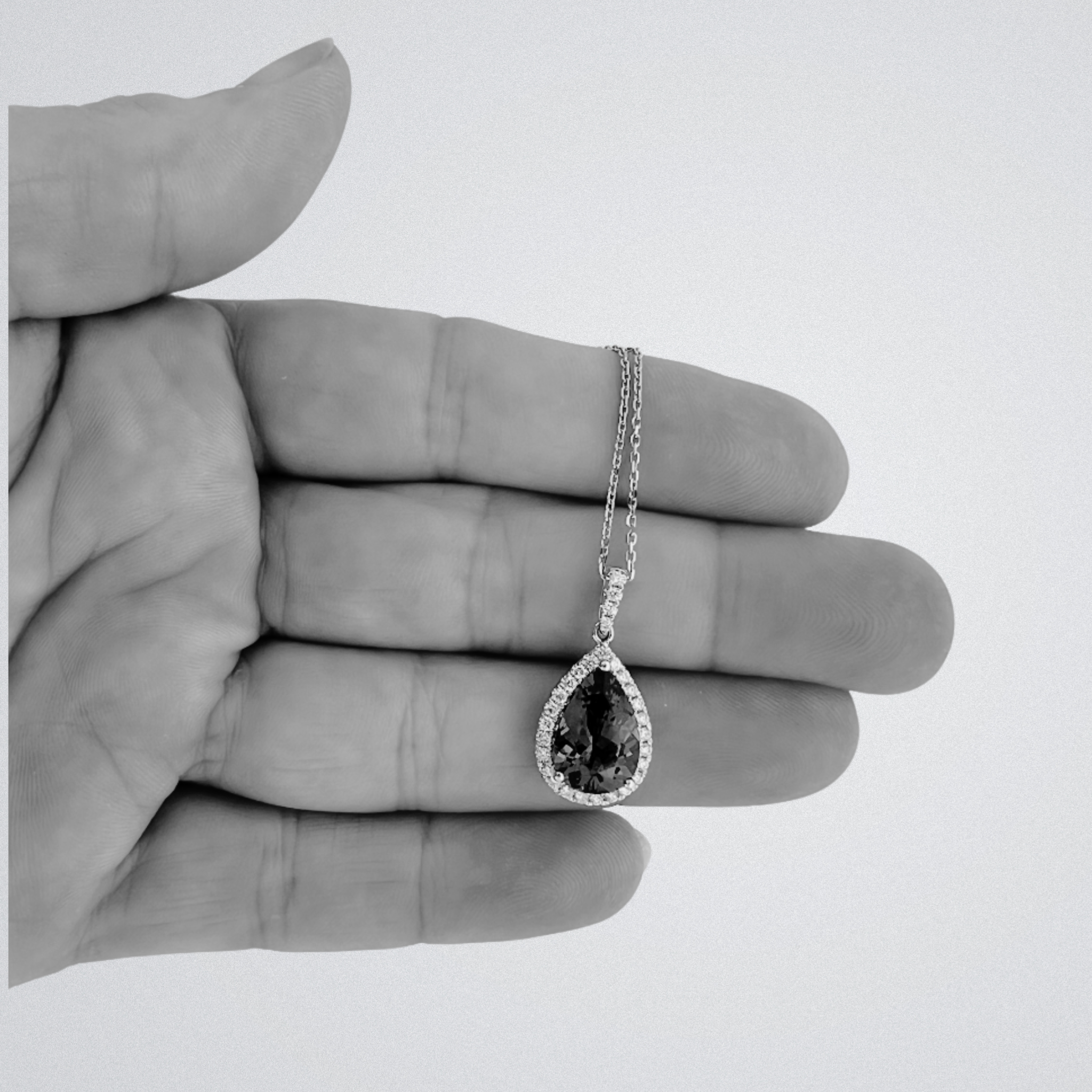 3.46 Ct Pear-Shaped Tanzanite Pendant With Diamond Halo