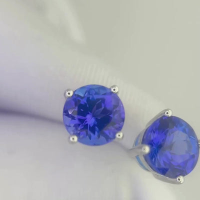 round  cut tanzanite earrings with rich blue and violet hues