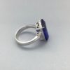 Exceptional 9.36 Ct Emerald Cut Tanzanite & Diamond Ring