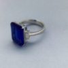 Exceptional 9.36 Ct Emerald Cut Tanzanite & Diamond Ring